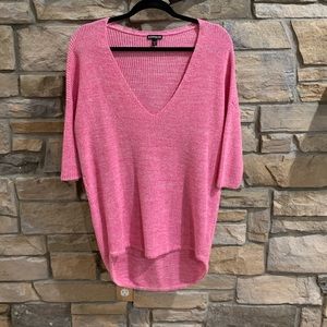 Long, pink sweater.